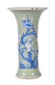 A Chinese small blue and white celadon-ground 'phoenix-tail' vase, gu, Kangxi, moulded in relief