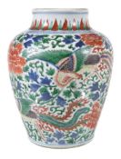 A Chinese Wucai baluster vase, painted with phoenix and peony, the neck with a band of foliate