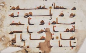 Vellum Qur’an folio written in kufic script.Text: sura XXXIII, al-Ahsab, The Confederates, part of