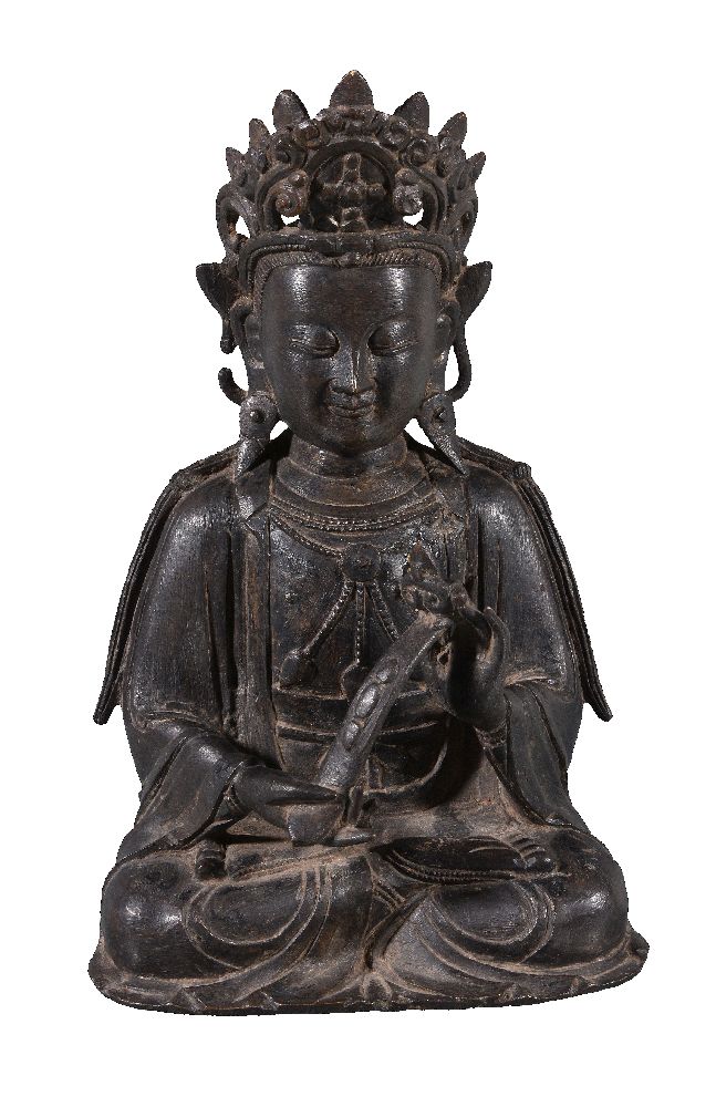 A Chinese bronze seated figure of Buddha, possibly 16th- 17th century, cast seated in dhyanasana