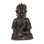 A Chinese bronze seated figure of Buddha, possibly 16th- 17th century, cast seated in dhyanasana