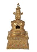 Y A Sino-Tibetan gilt-bronze Stupa, of bell-shaped form on raised square pedestal