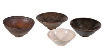 Three Chinese 'Jian' bowls, Song Dynasty, one with hare's fur glaze, the two others with mottled
