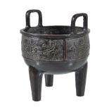 A Chinese archaistic bronze tripod censer, ding, after a Western Zhou original, the body supported