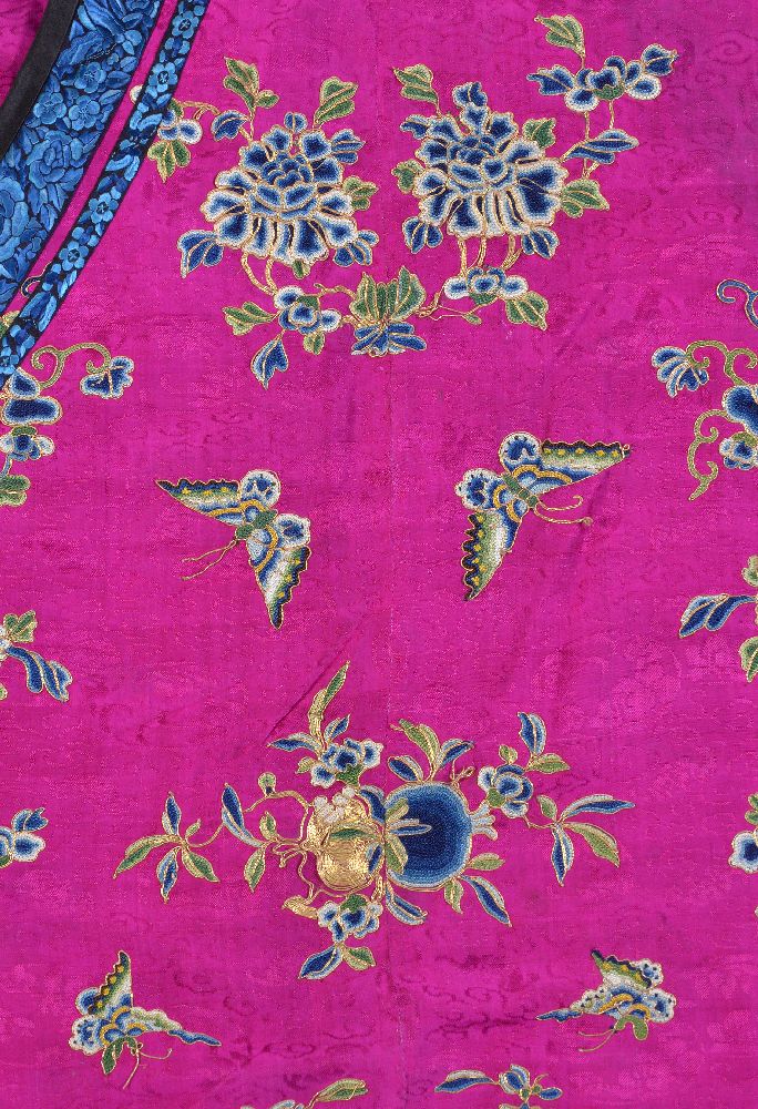 A Chinese embroidered magenta satin woman's side opening informal jacket, Qing Dynasty, late 19th - Image 4 of 7