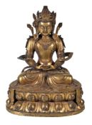 A large Sino-Tibetan gilt-bronze figure of Amitayus, cast seated in dhyanasana on a tall double-