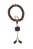 A string of Chinese wood rosary beads, Shouchuan, consisting of twenty large wood beads, possibly