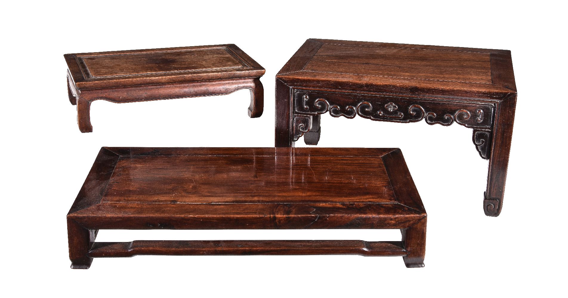 Three Chinese hardwood low tables or stands, late Qing Dynasty, 19th century, all of pegged