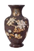 Y A Japanese carved wood vase of baluster form resting on a later stepped foot