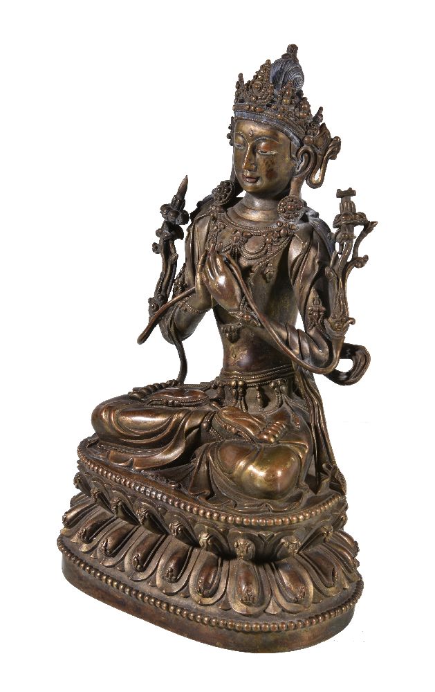 A Sino-Tibetan gilt- bronze figure of Manjusri, Qing Dynasty, China, 19th century, seated on a - Bild 2 aus 5