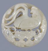 A Chinese pale celadon 'cockerel' pendant, of pierced circular form standing on flowers, 6.6cm