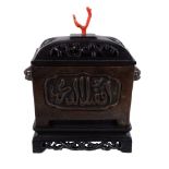 Y A Chinese rectangular bronze censer, with Arabic script to the two long sides and Buddhist lion