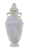 A Chinese mottled white jade vase and cover, with green and lavender inclusions, of flattened
