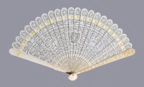 Y A Chinese ivory brise fan, Canton, first quarter of the 19th century, carved on one side, with
