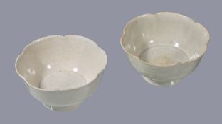 A pair of Qingbai petal-lobed high-footed bowls, Song Dynasty, each with flared sides divided into