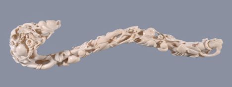Y A Cantonese ivory ruyi sceptre, Qing Dynasty, circa 1880-1900, carved with auspicious double