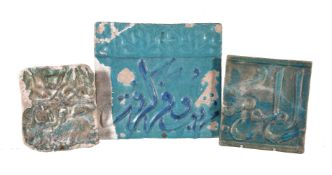 Three Kashan moulded turquoise glazed tiles, Persia, circa 13th century, the larger with calligraphy