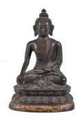 A Sino-Tibetan bronze Buddha, Qing Dynasty, 18th century, seated on a double lotus throne, his hands