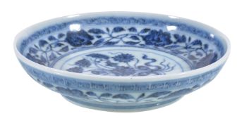 A attractive small Chinese blue and white 'Lotus Bouquet' dish, painted to the interior with a