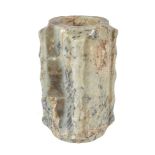 A Chinese celadon brown and black flecked jade cong, the tall rectangular body of square section,