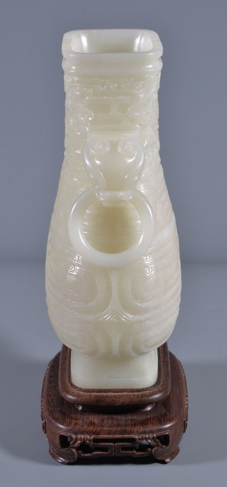 A Chinese white jade vase, hu, the pear-shaped vessel quartered on each side by high strapwork - Image 2 of 6
