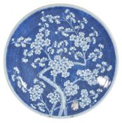 A Chinese blue and white 'prunus' dish, Qing Dynasty, 19th century, 37cm diameter