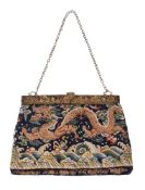 A Chinese dragon embroidered handbag, Qing Dynasty, 19th century, from a chaofu robe, made into