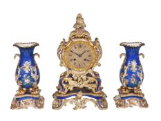 A Charles X/Louis-Philippe Paris porcelain (Ed. Honoré) blue-ground and gilt clock garniture,