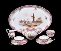 A Dresden porcelain tête-à-tête tea service, circa 1900, painted in the Meissen manner,