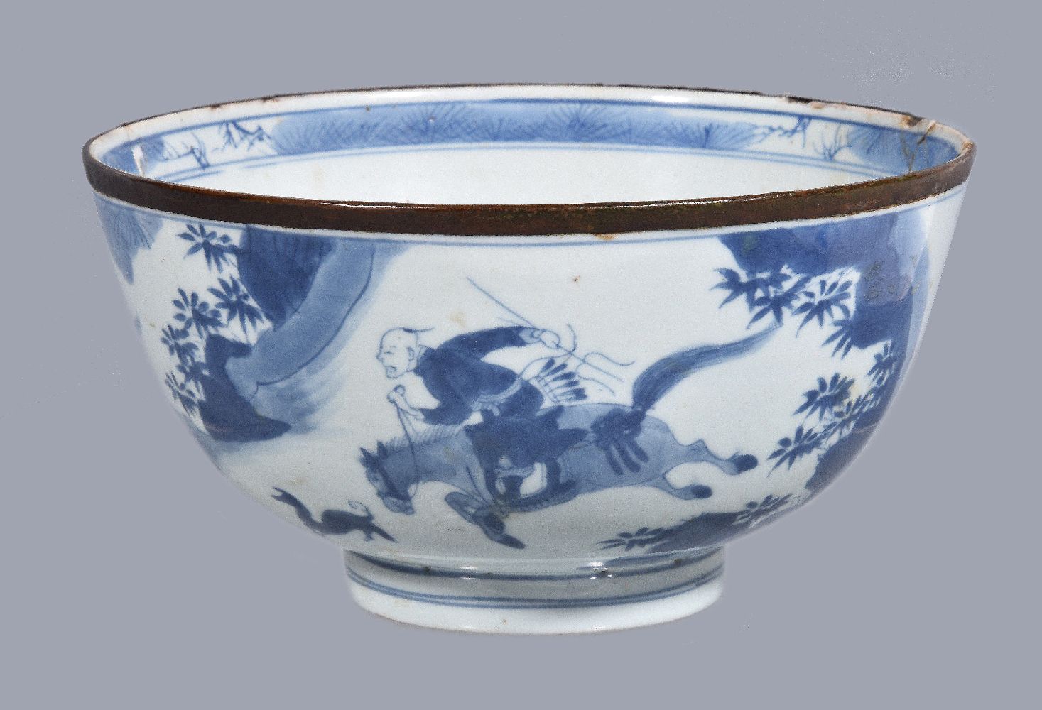 A Chinese blue and white bowl, circa 1650, decorated in cobalt blue with a hunting scene depicting - Image 2 of 4