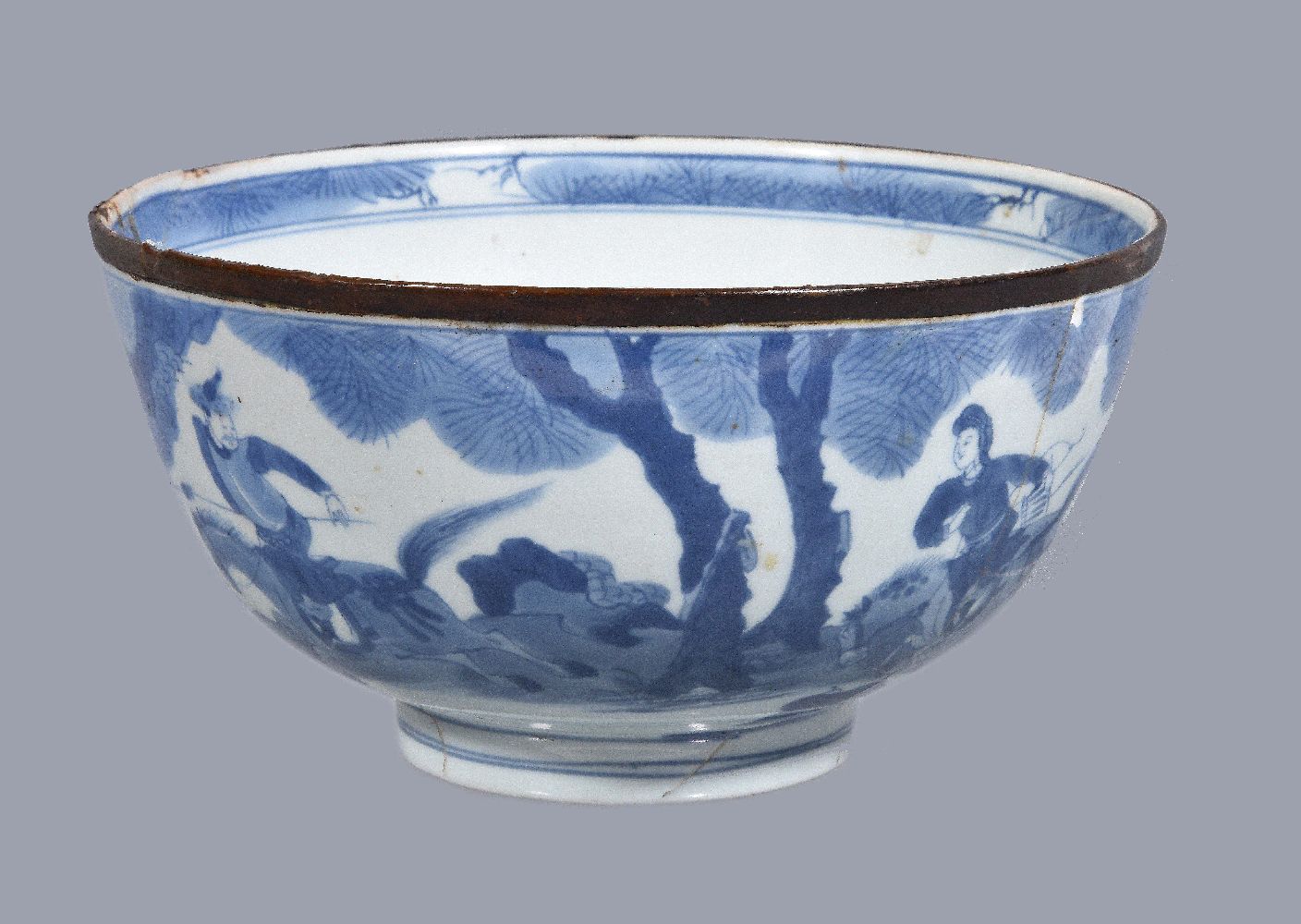 A Chinese blue and white bowl, circa 1650, decorated in cobalt blue with a hunting scene depicting