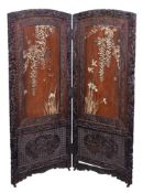 Y A Japanese Two-Fold Wood Screen, each leaf well carved within a frame of dragons amid clouds