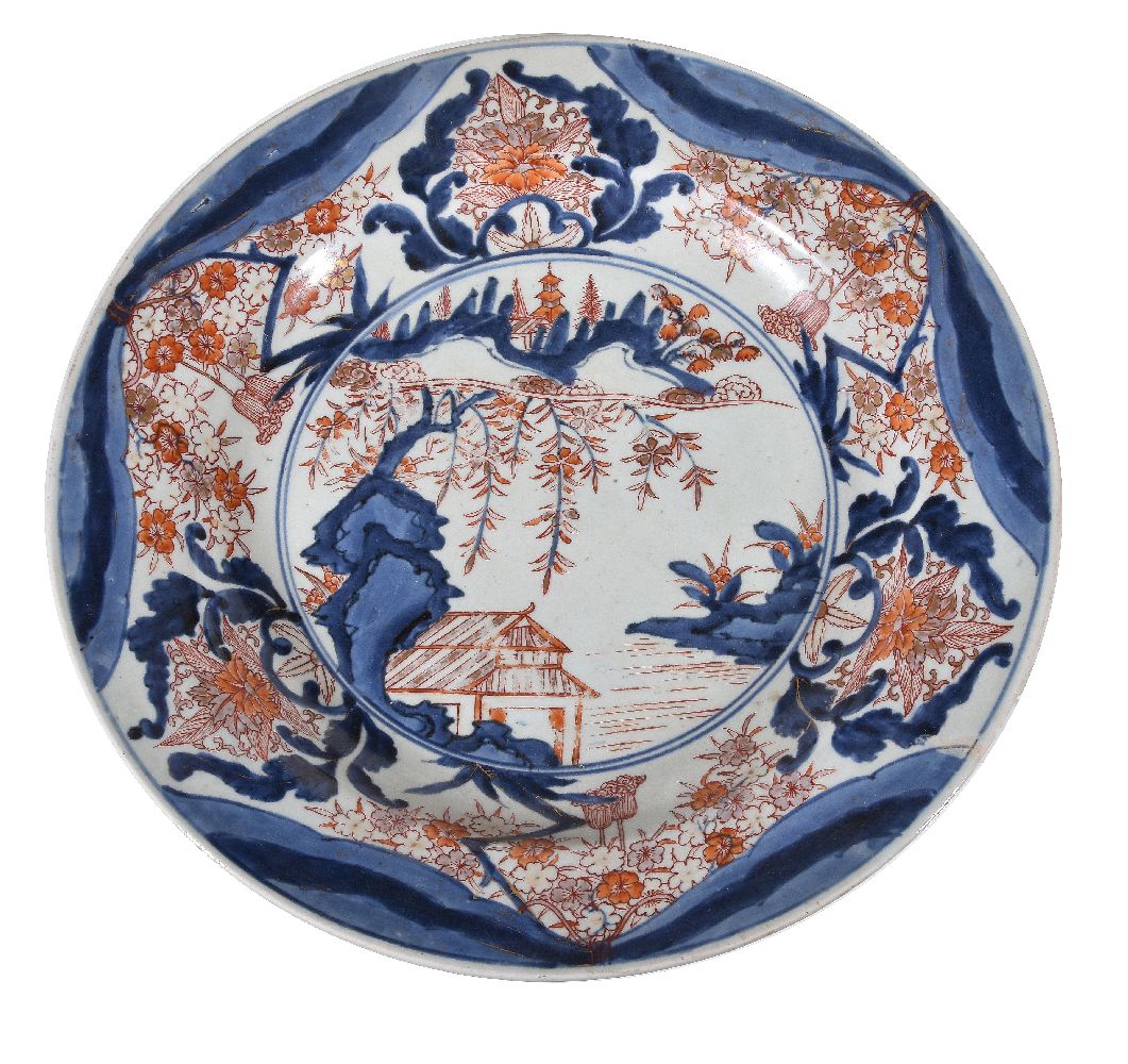 A Japanese Artia Charger, painted in underglaze blue and iron-red and gilding, 42.4.cm diameter,