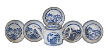 A Chinese 'Ling Long' blue and white teapot and cover, Qing Dynasty, painted with landscape panels