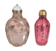 A Chinese ruby-red glass scent bottle and stopper, the lobed body incised with characters