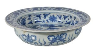 A Chinese blue and white basin, the centre painted with a mythical beast, apocryphal Xuande six