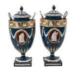 A pair of Wedgwood glazed parian classical urns and covers, late 19th century, sprigged in low