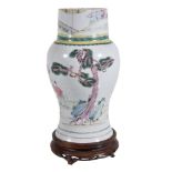 A Chinese Famille Rose vase, Yongzheng, cut down from a Phoenix tail vase, painted in yellow, mauve,