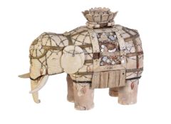 Y A Japanese Model of an Elephant, the animal stands four-square and is formed of ivory panels