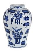 A large Chinese blue and white vase, Qing Dynasty, painted with precious objects, 38cm high
