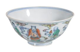 A Chinese Doucai 'Eight Immortals' bowl, potted with gently curved sides rising to a slightly