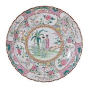 A Japanese porcelain circular charger, circa 1900-1920, painted in pink, green, turquoise and yellow