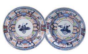 A pair of Arita shallow bowls, circa 1700, decorated in underglaze blue, over glaze enamels and