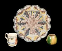 Three items of English creamware, circa 1760, comprising:a relief-moulded plate decorated with