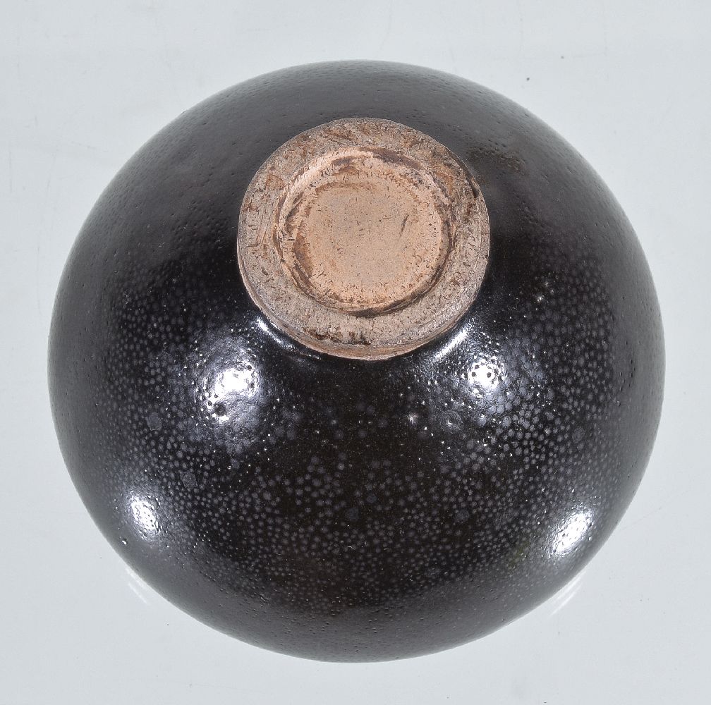 A Chinese 'oil-spot' small bowl, potted with rounded sides supported on a short splayed knife- - Image 2 of 2