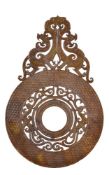 A Chinese Han-style reticulated brown and yellow jade disc, bi, cut with a central openwork of