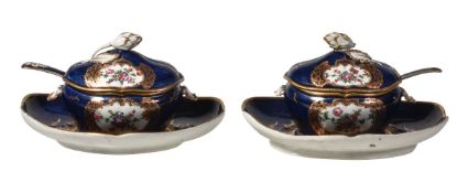 A pair of Worcester blue-ground sauce tureens, covers, ladles and stands, circa 1770, painted with