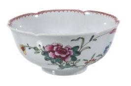 A Worcester polychrome famille rose slop bowl, 12cm diameter, shaped rim, decorated with a crane