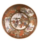 A Japanese Satsuma pottery bowl, of shallow circular form decorated in over glaze enamels and