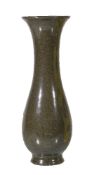 A Chinese ‘tea dust’ glazed vase, of baluster form with trumpet neck, the base with raised four